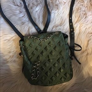 Hunter Green quilted backpack with black straps